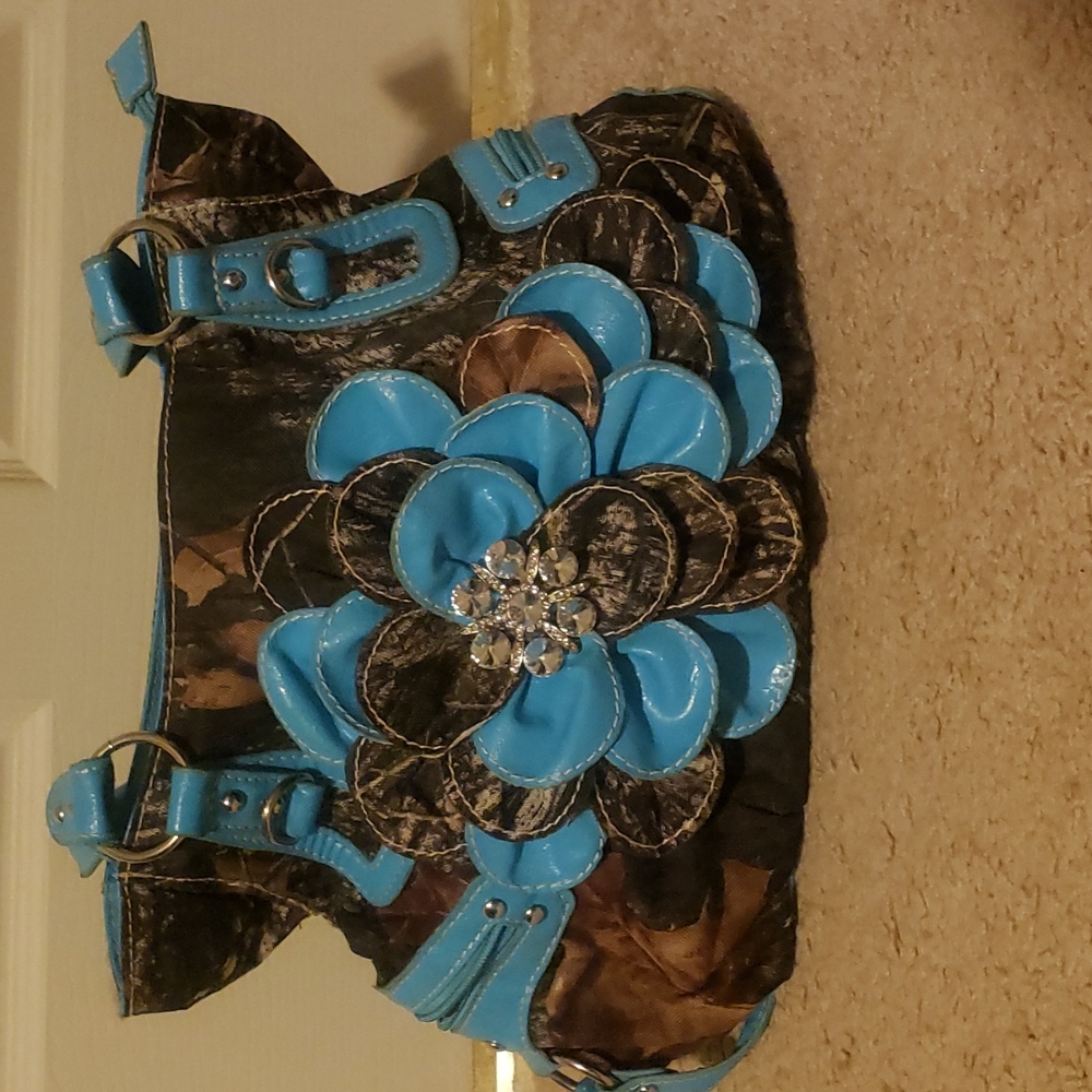 Camouflage and blue pocketbook